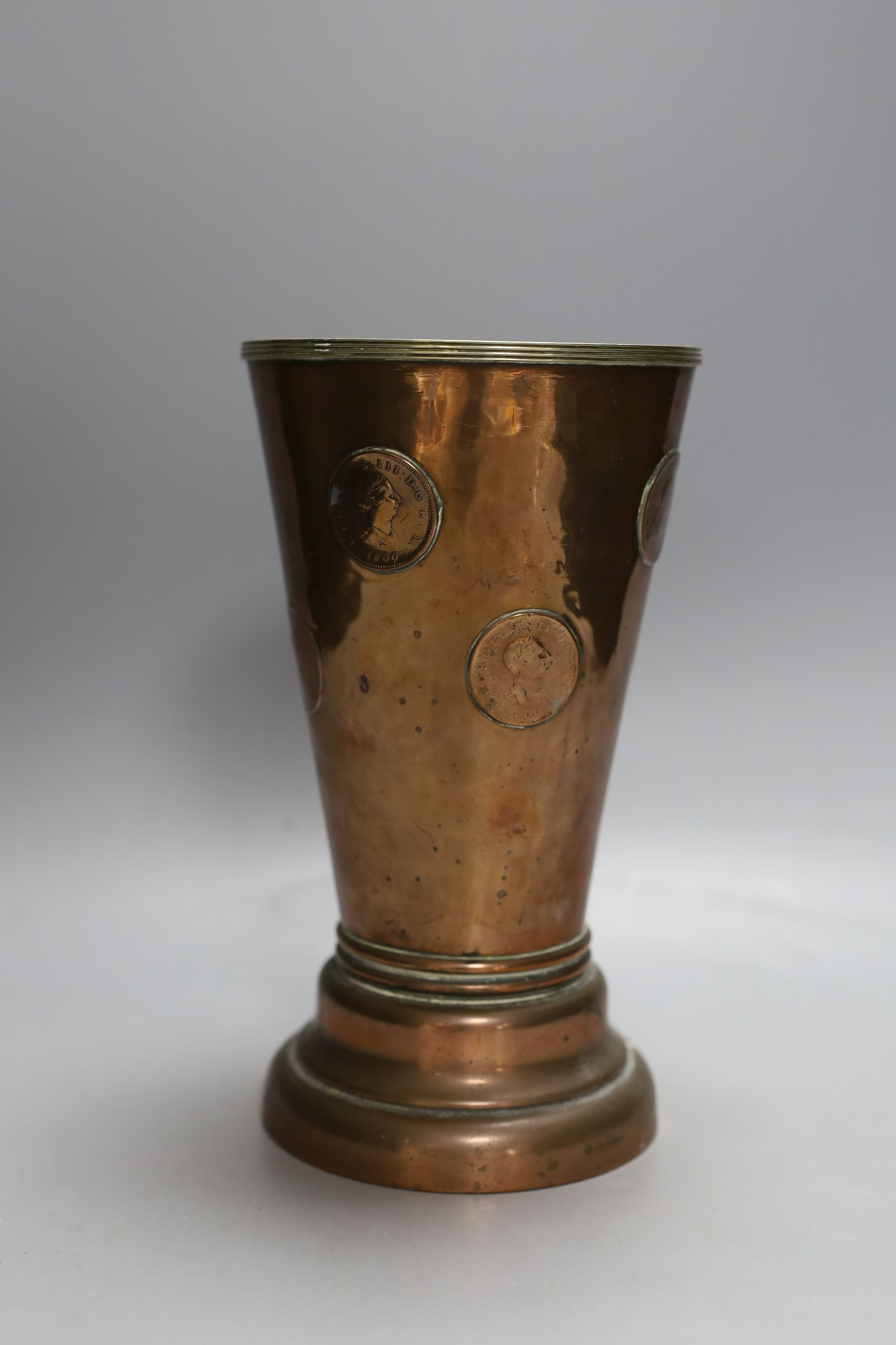 A Georgian copper gaming cup with dice in base, 20cm